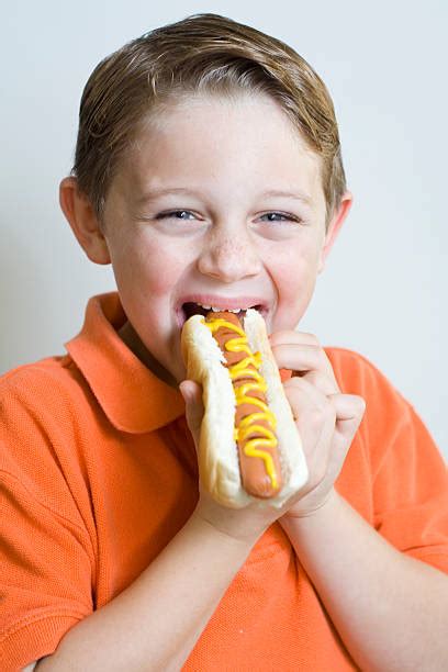 dog and boy sexy|boy eating hot dog.